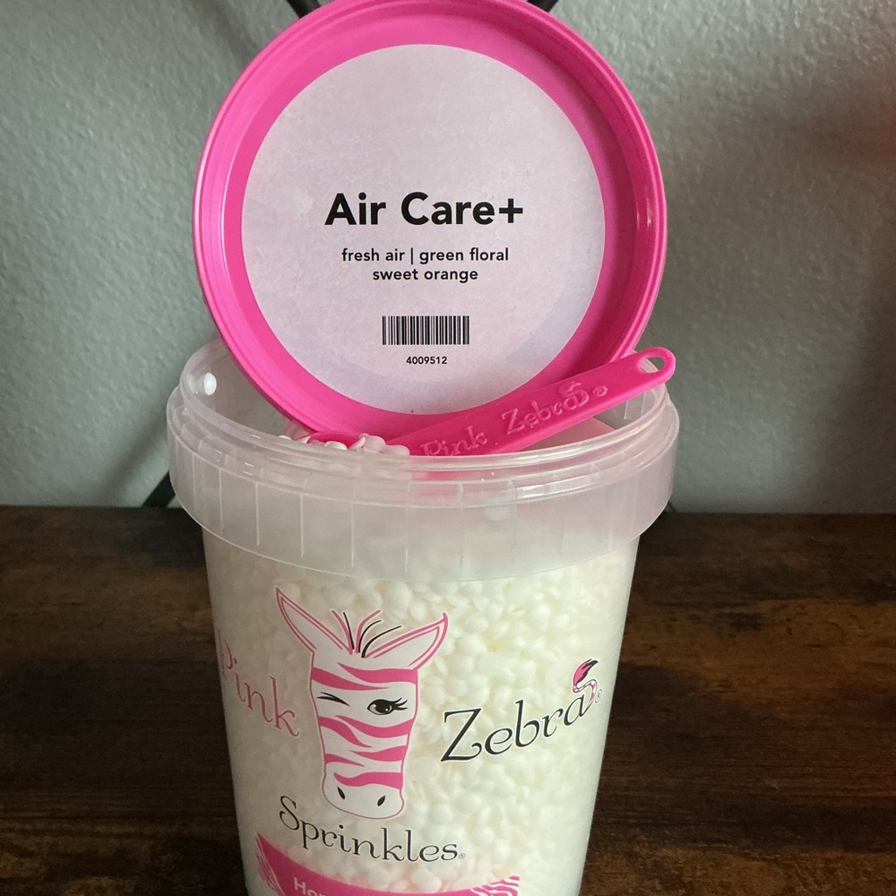 Air Care+ Pink Zebra Wax Melts in a 4 oz blend bag.